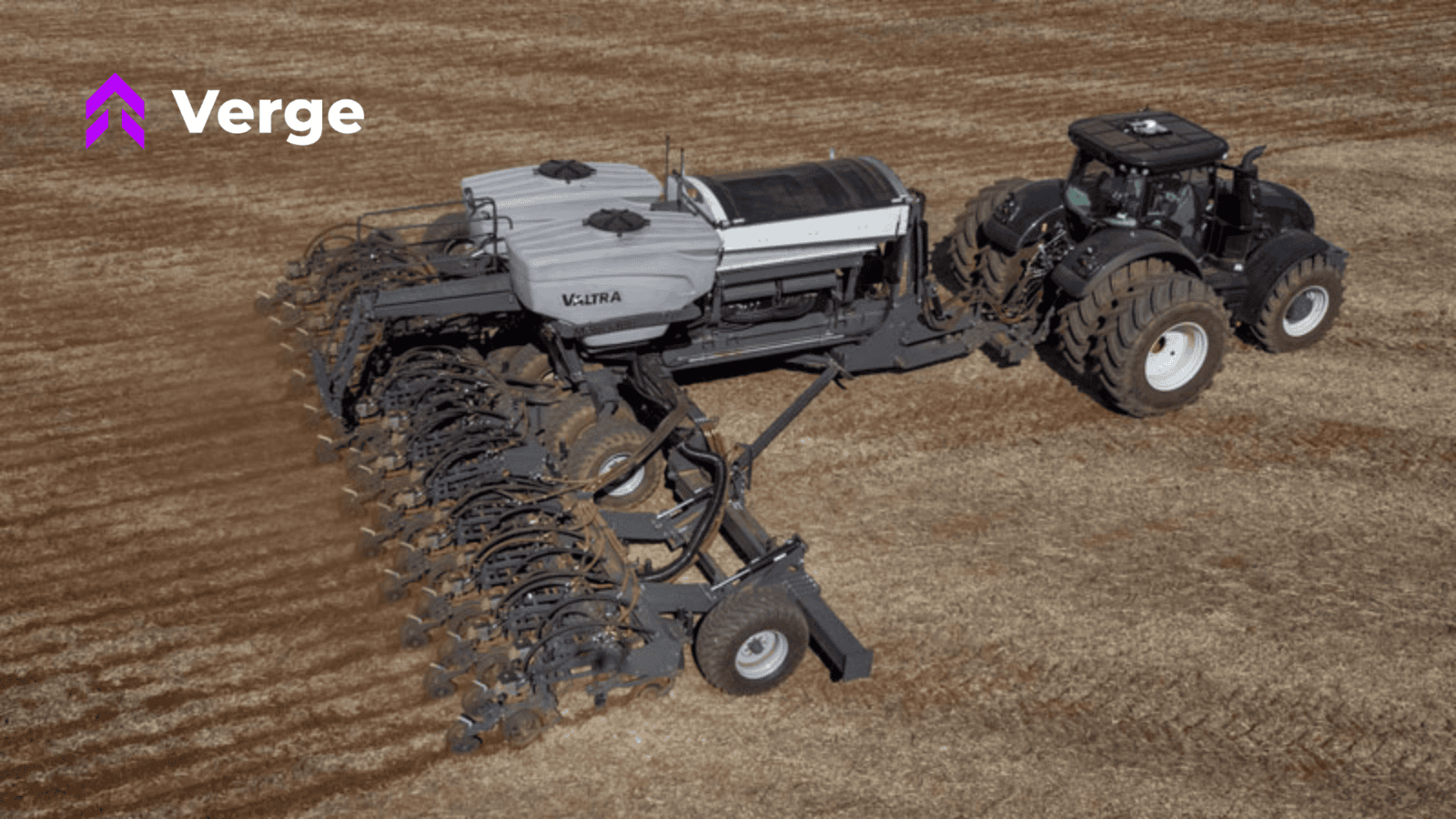 Tractor with planter in field